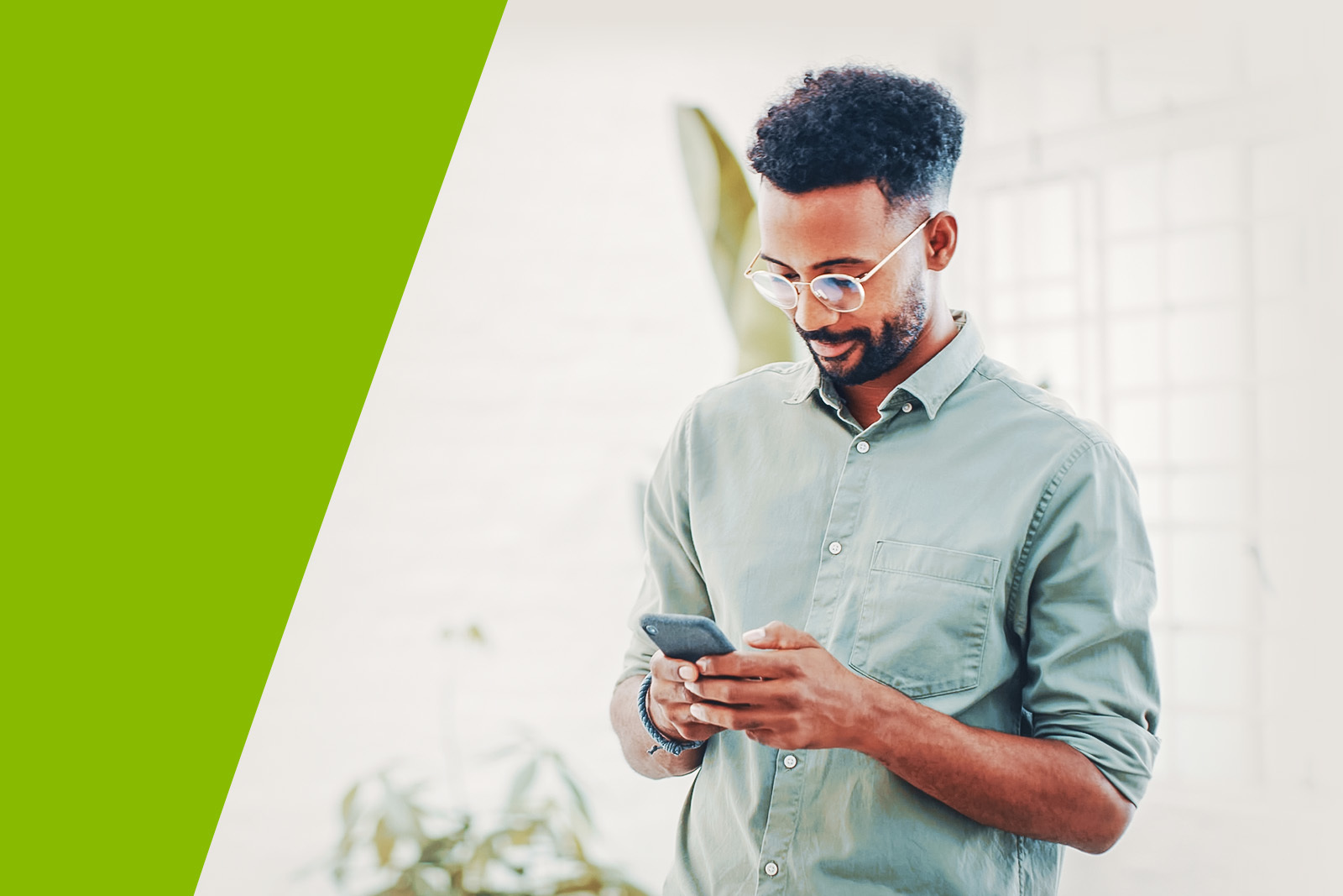 man looking at phone