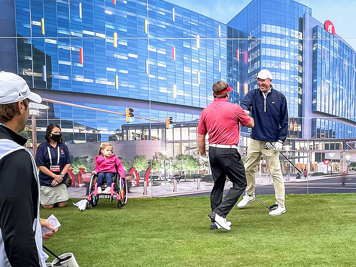 Georgia football coach Kirby Smart shares a fist bump with...