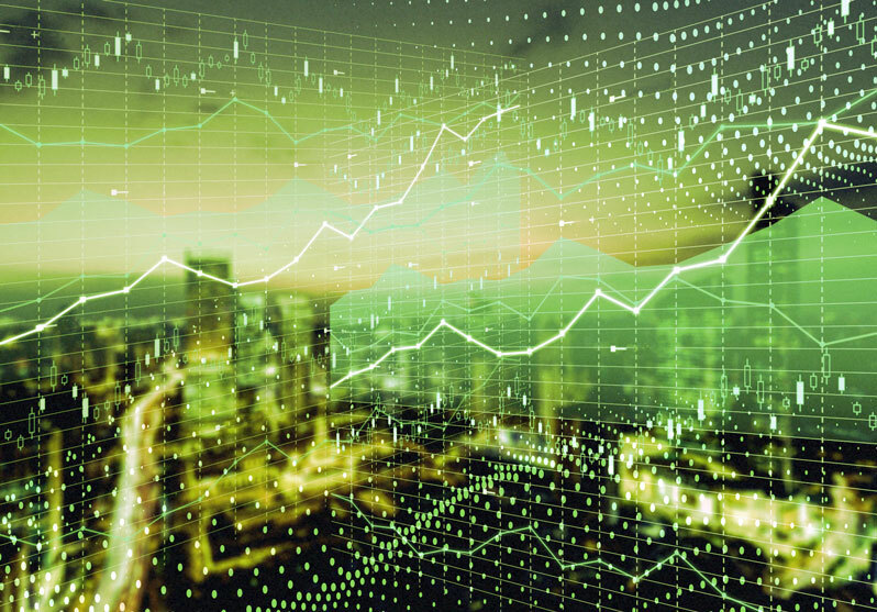 abstract image of financial graphs and skyline