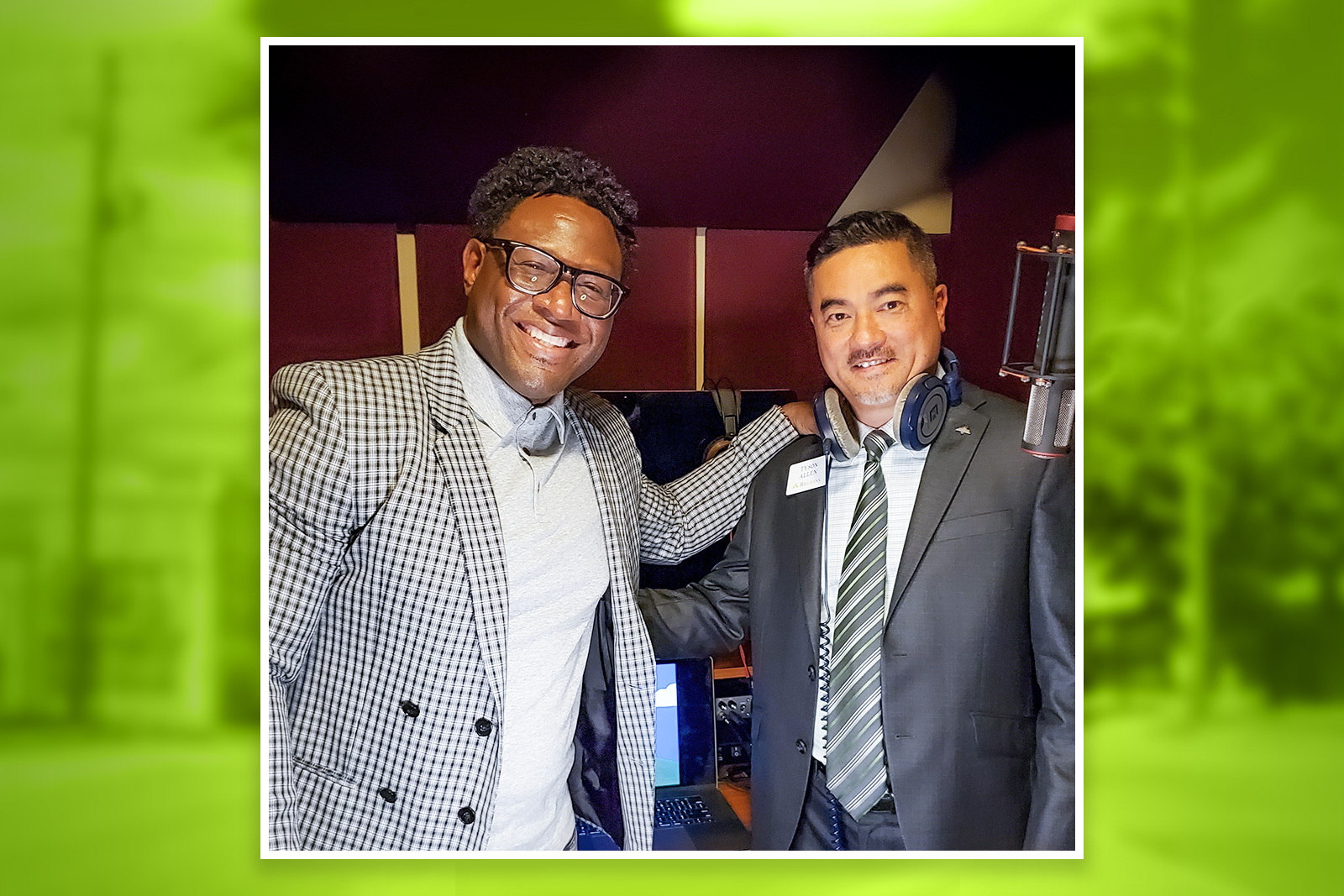 two men smiling at camera