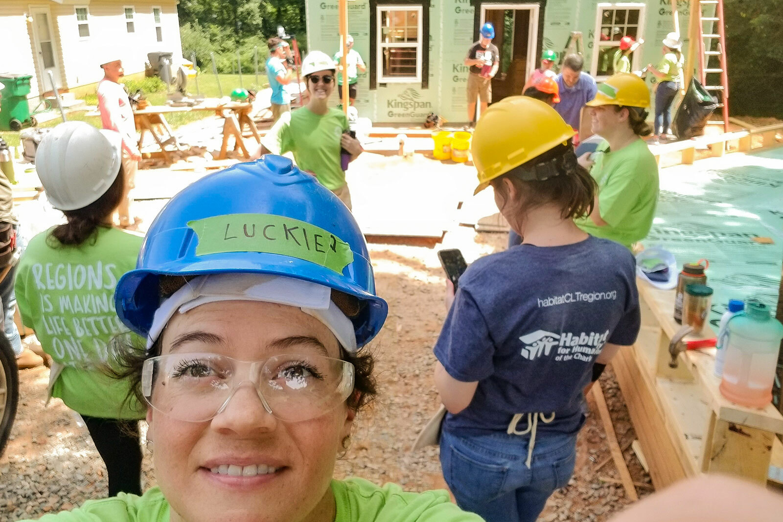 people at home-building event