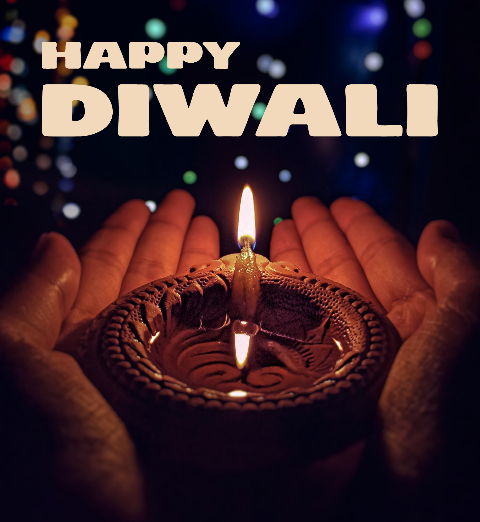 Hands holding Diya. Text: Happy Diwali.