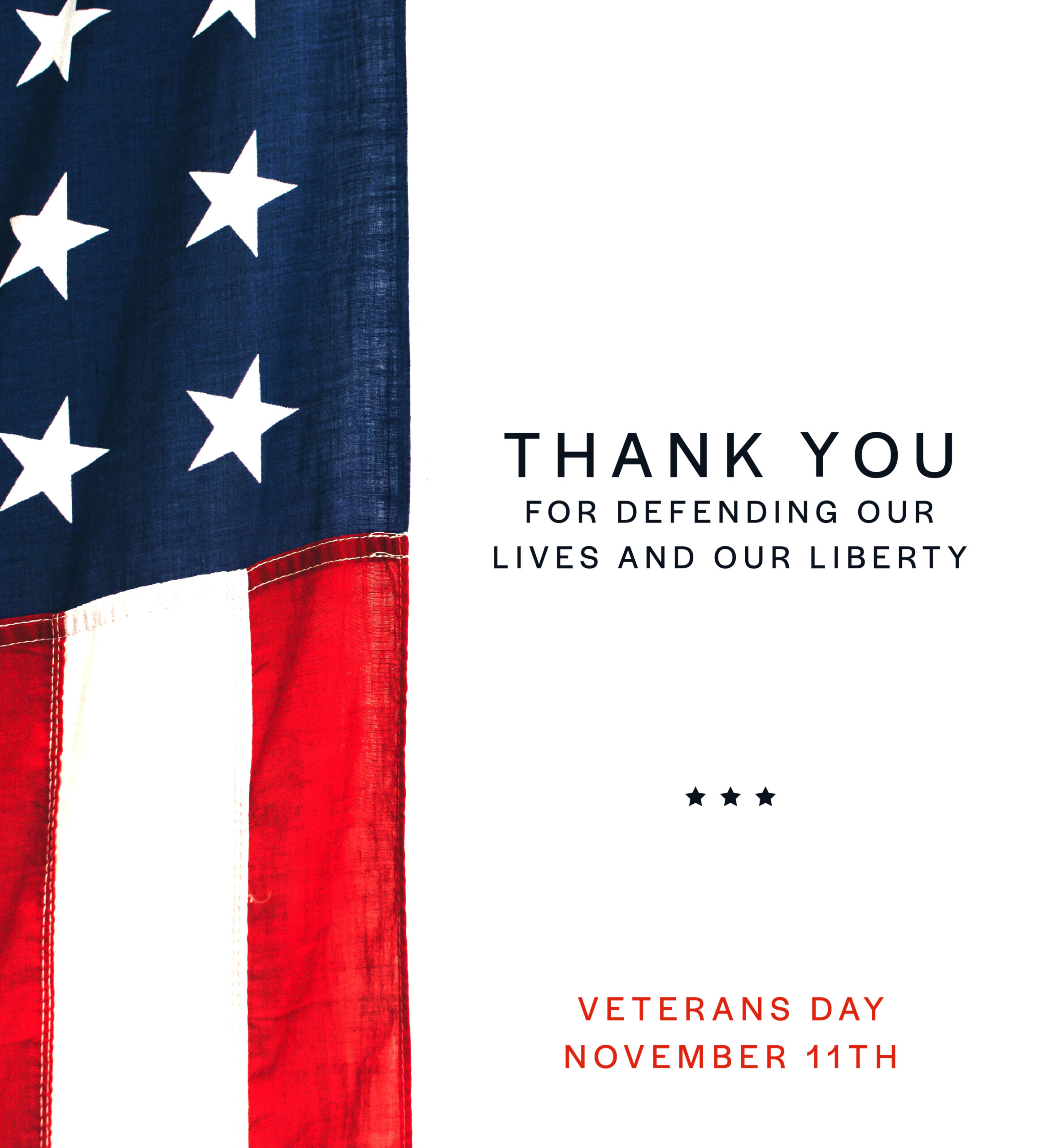 Close up of American flag. Text: Thank you for defending our lives and our liberty. Veterans Day November 11th.