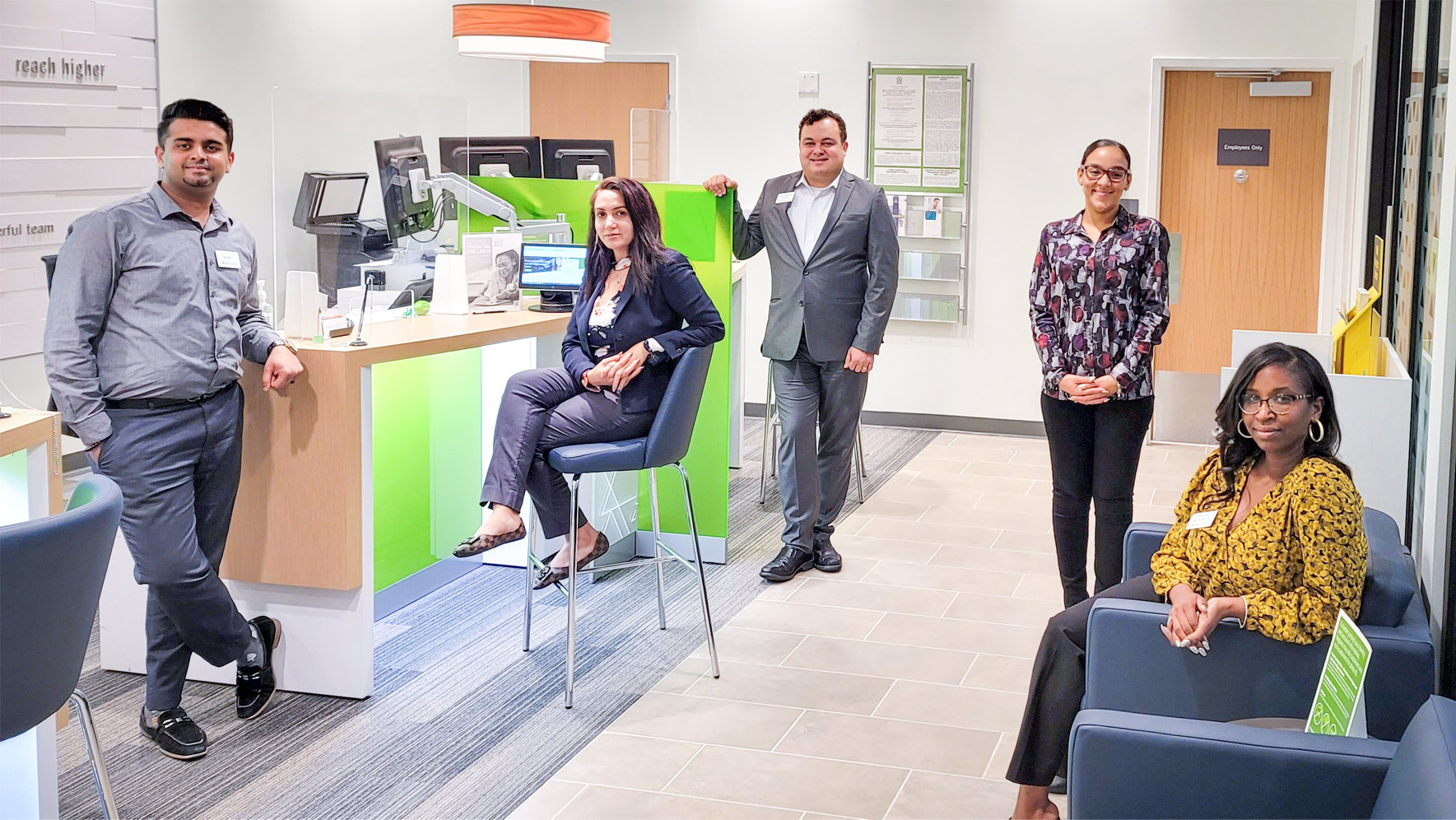 Regions Bank associates inside new bank branch.