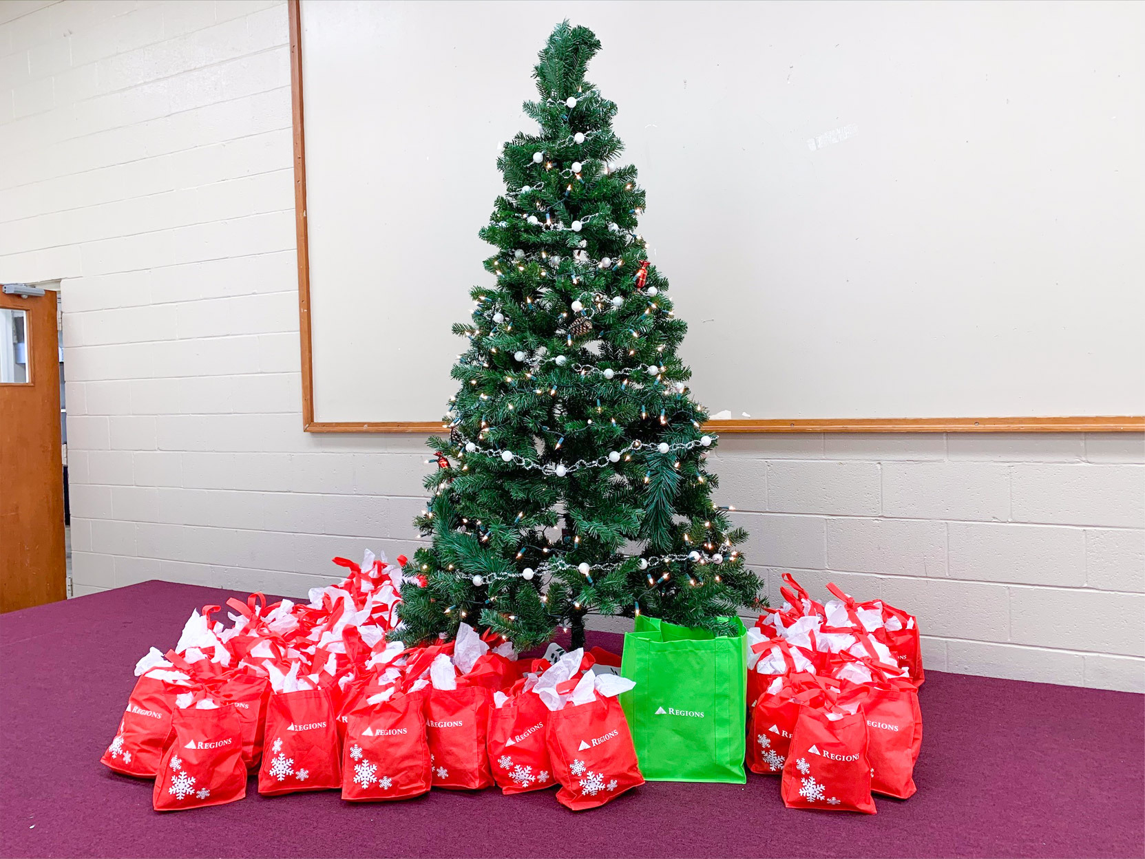 christmas tree with Regions gift packages