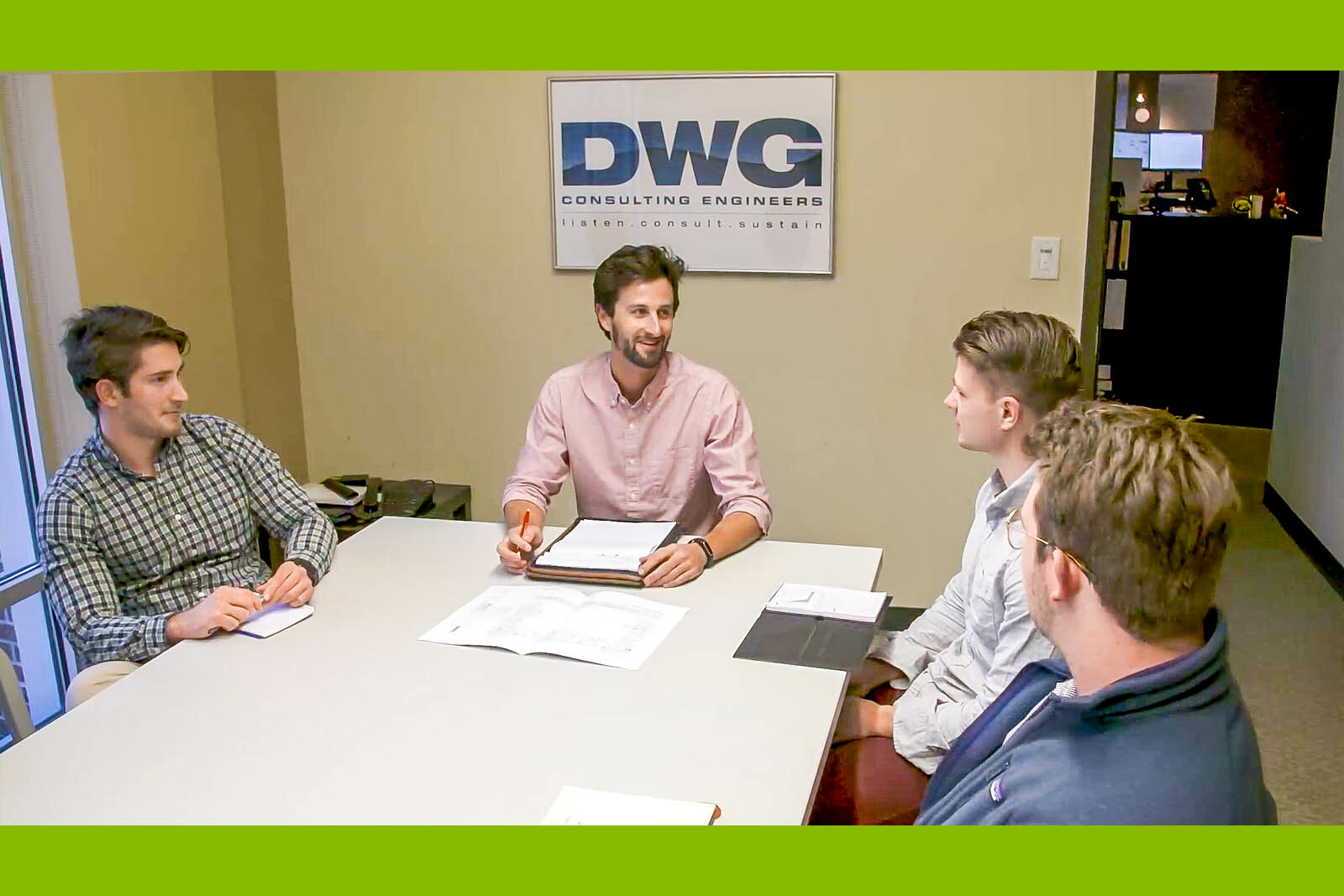 employees seated at a table
