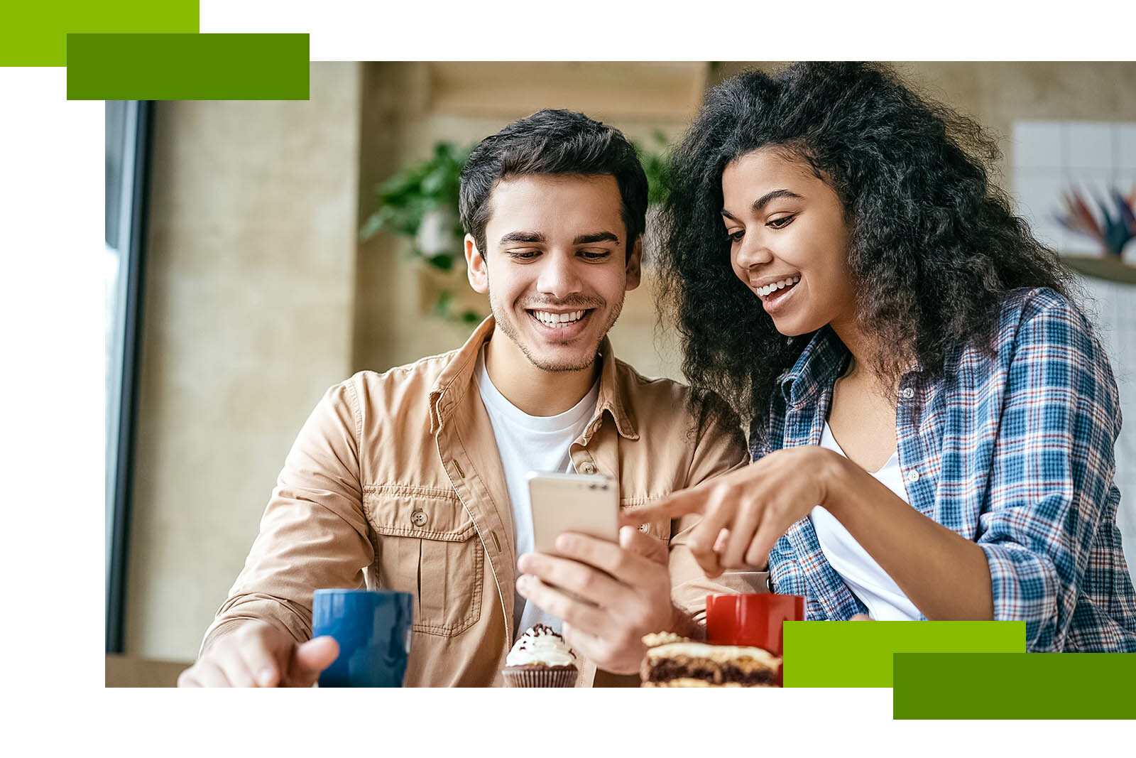 Two people looking at phone screen
