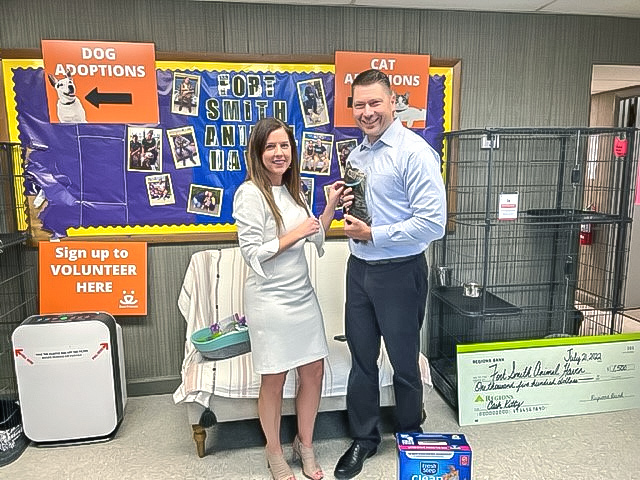 photo of Megan Nichols, Troy Dryzga, and Cash the Cat