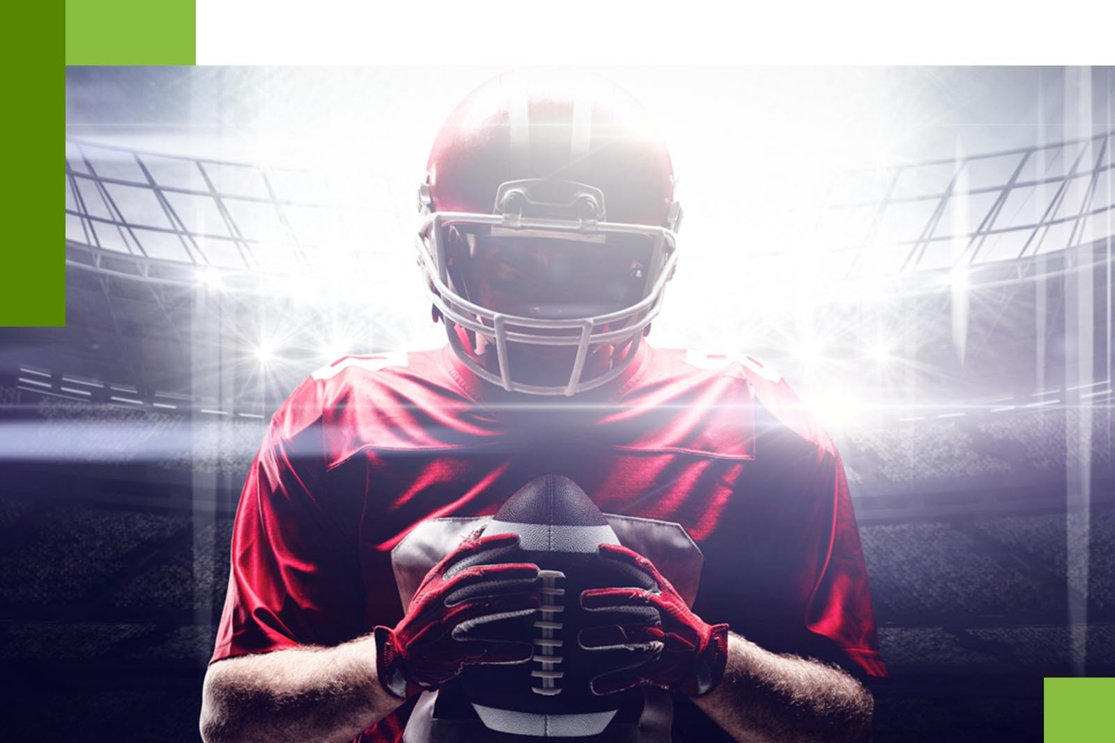 football player directly facing the camera with bright light behind...