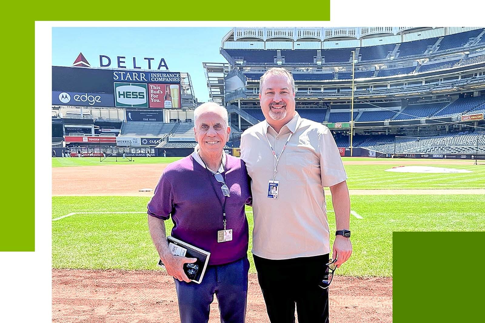 two men at baseball field