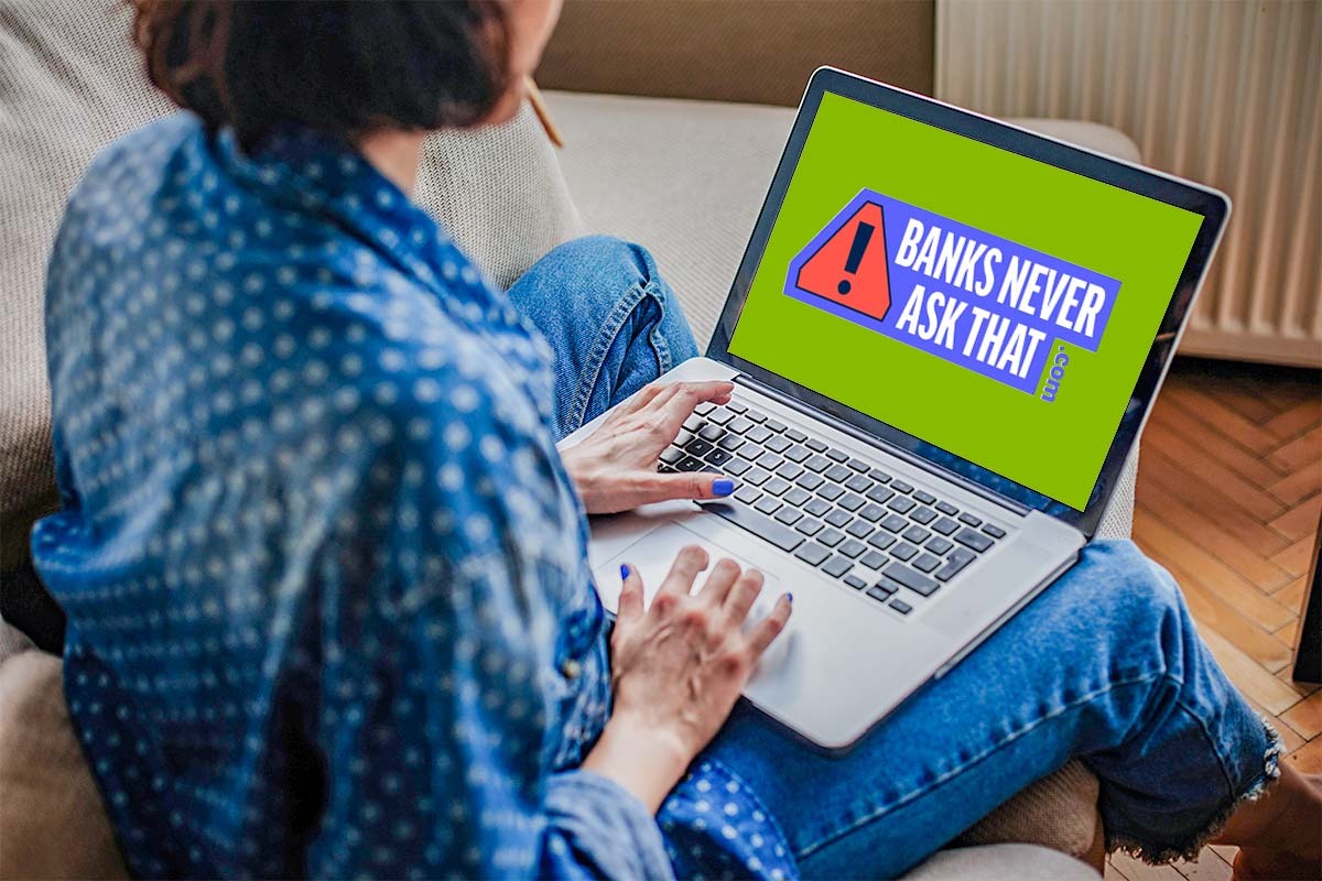 woman with back to the camera on a laptop. laptop...