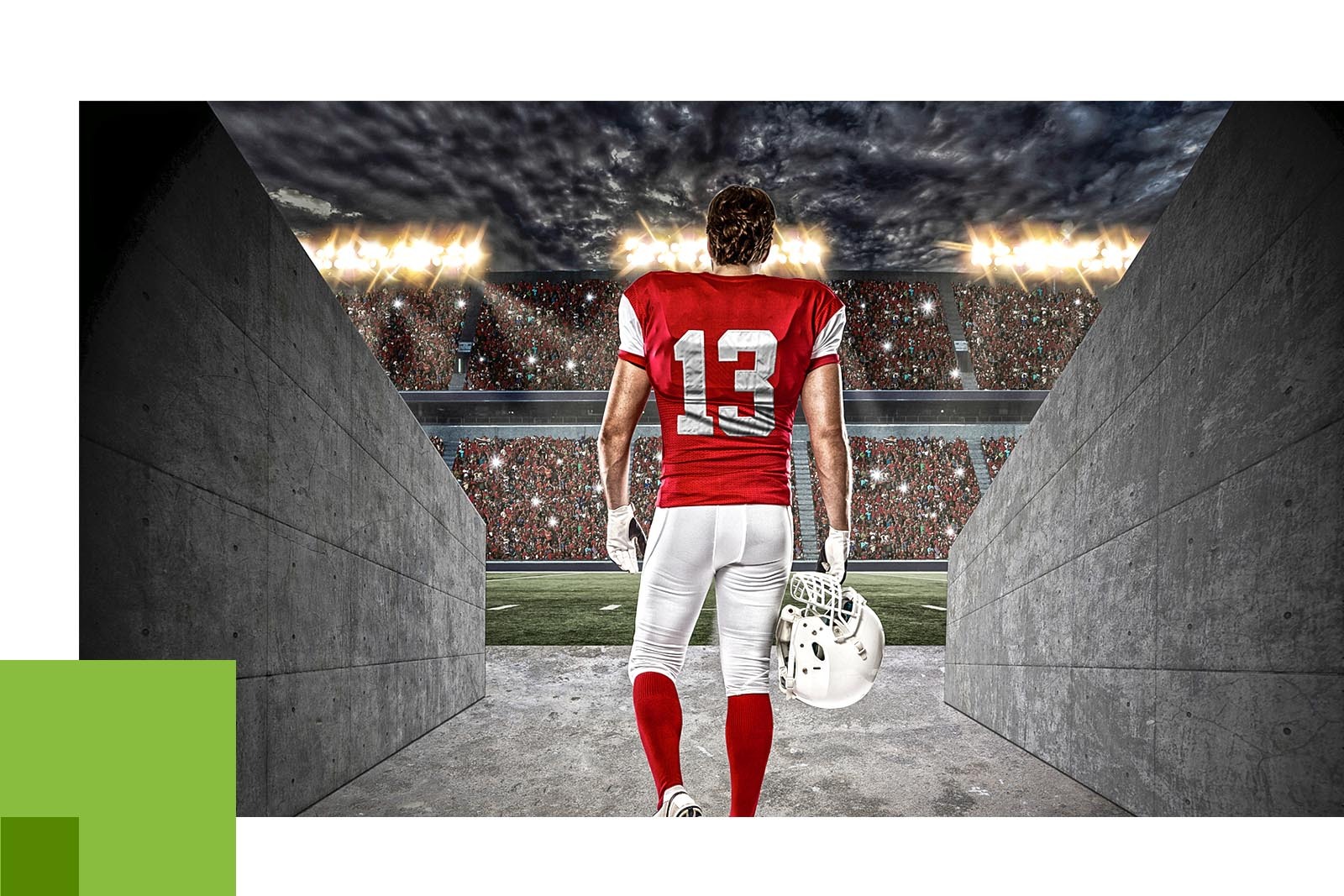 photo of football player. walking away from the camera and...