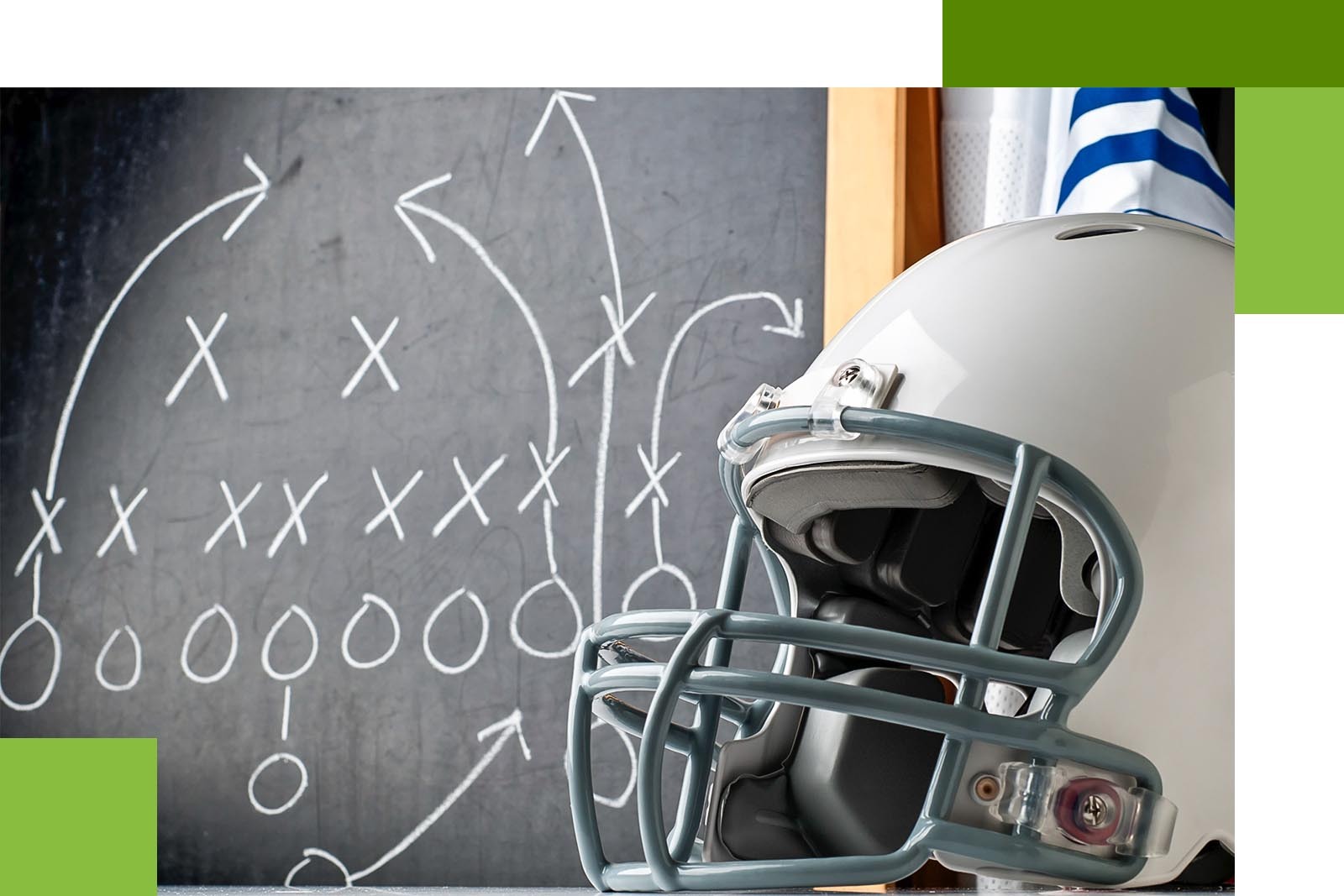 football helmet with chalkboard behind. on chalkboard is a football...