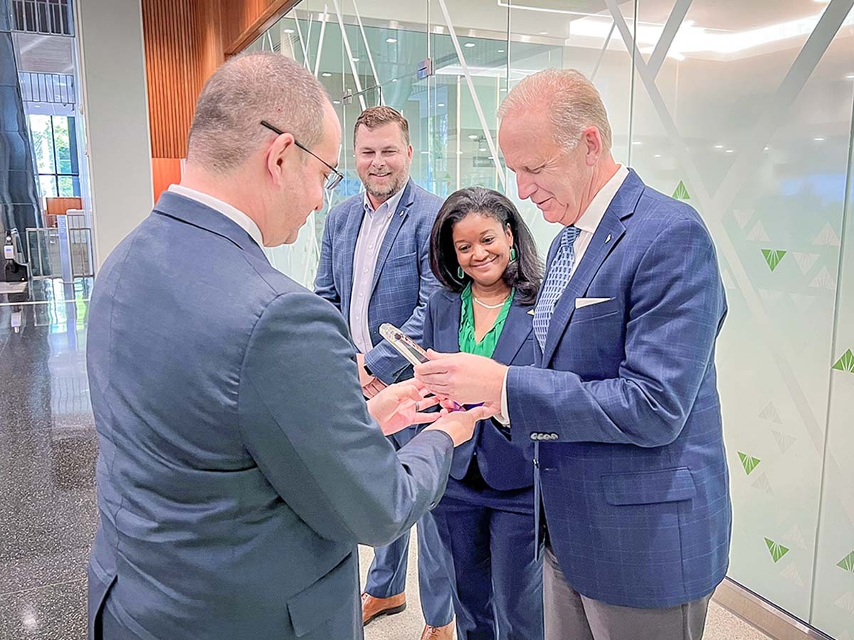 group looking at award