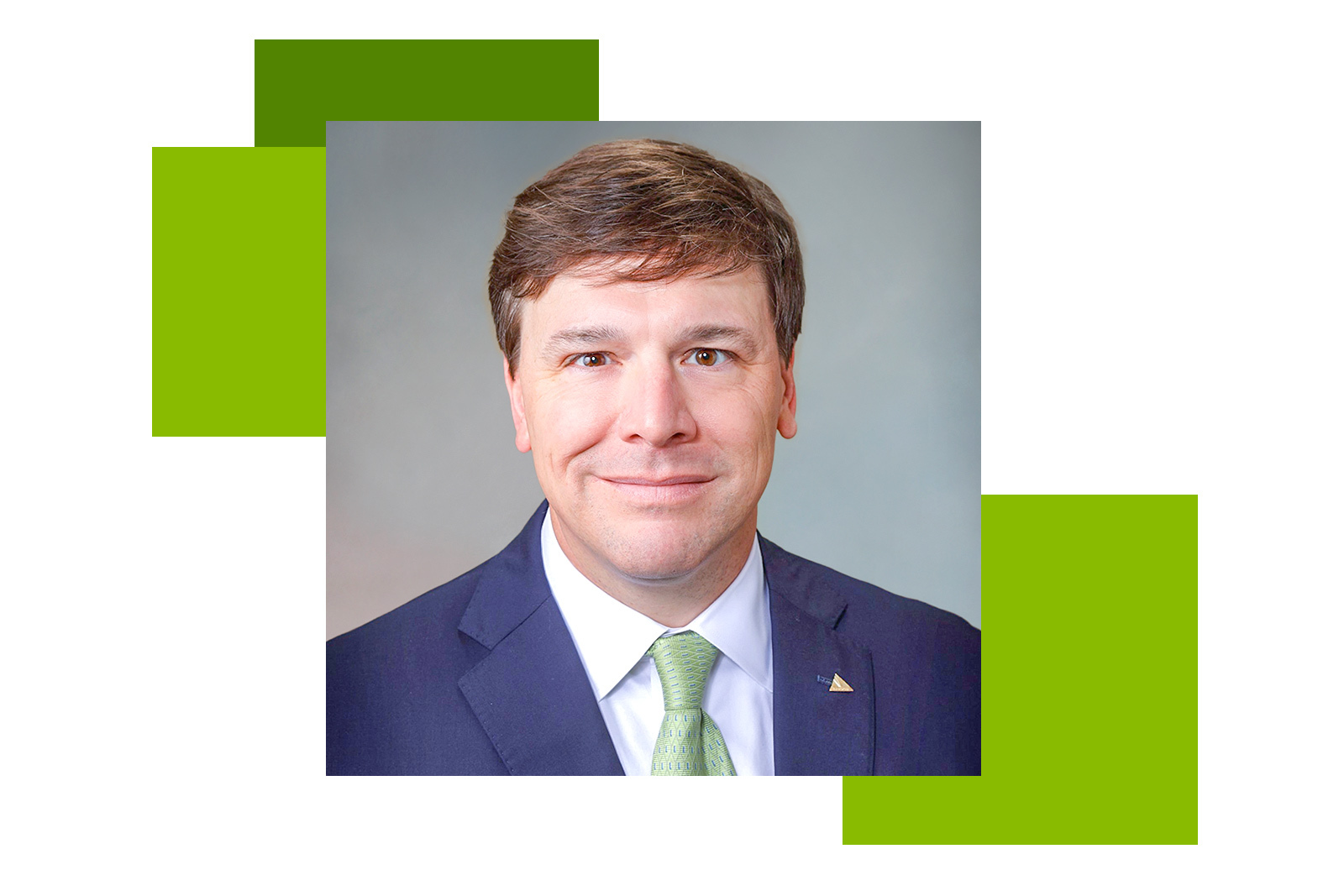 Professional headshot of Ryan Strawbridge. He is a middle aged...