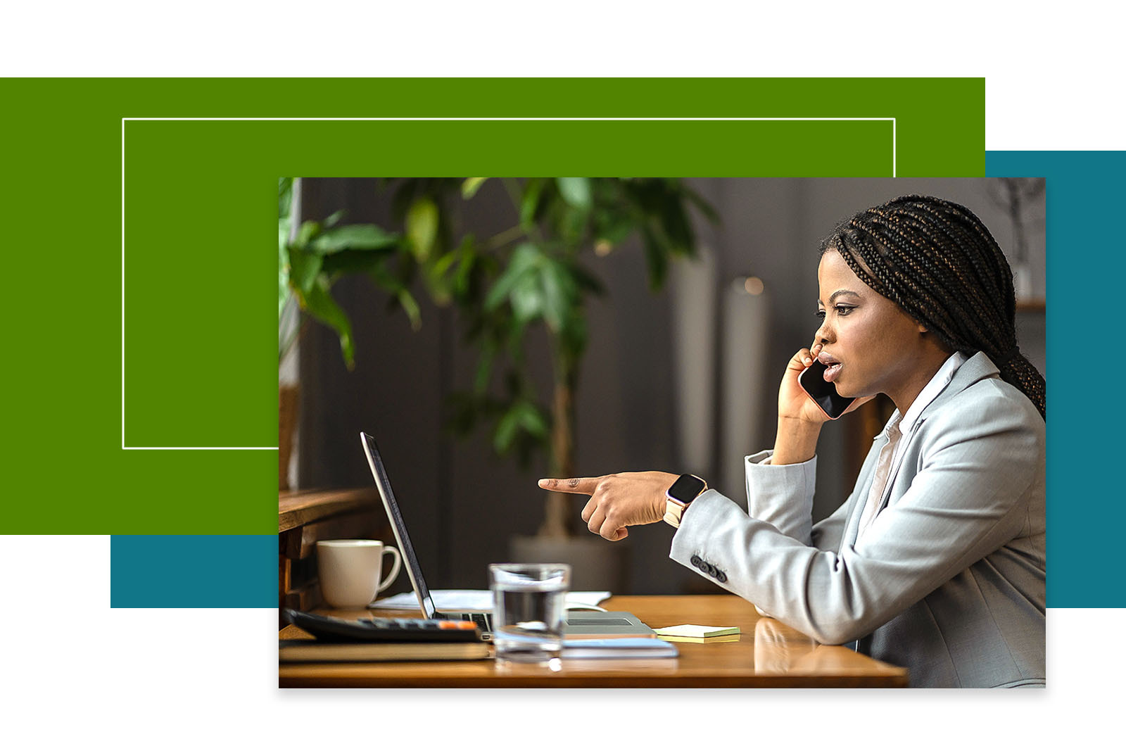 A person on the phone in front of the compute