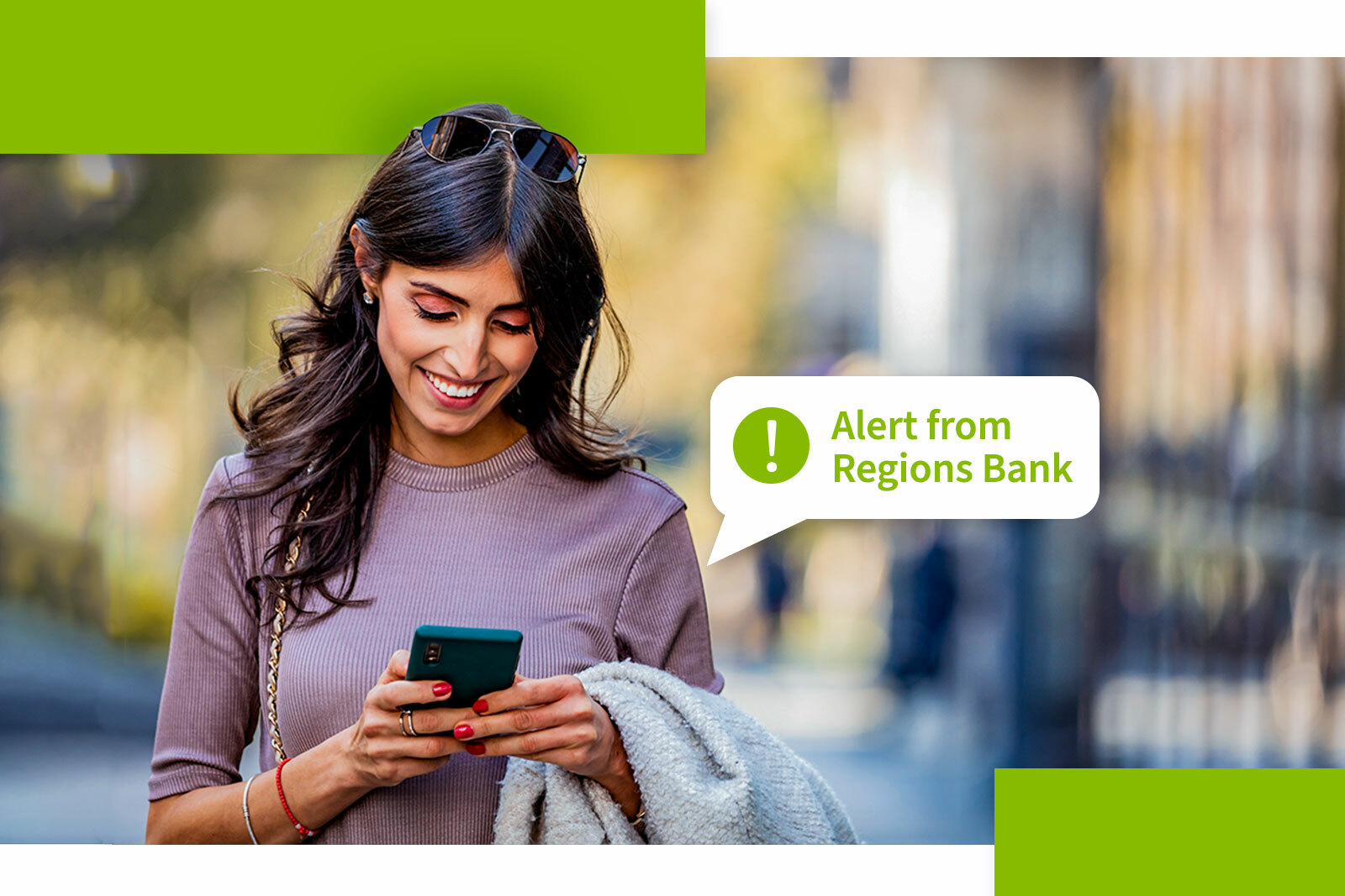 Middle adult woman standing in a city scape smiling and...