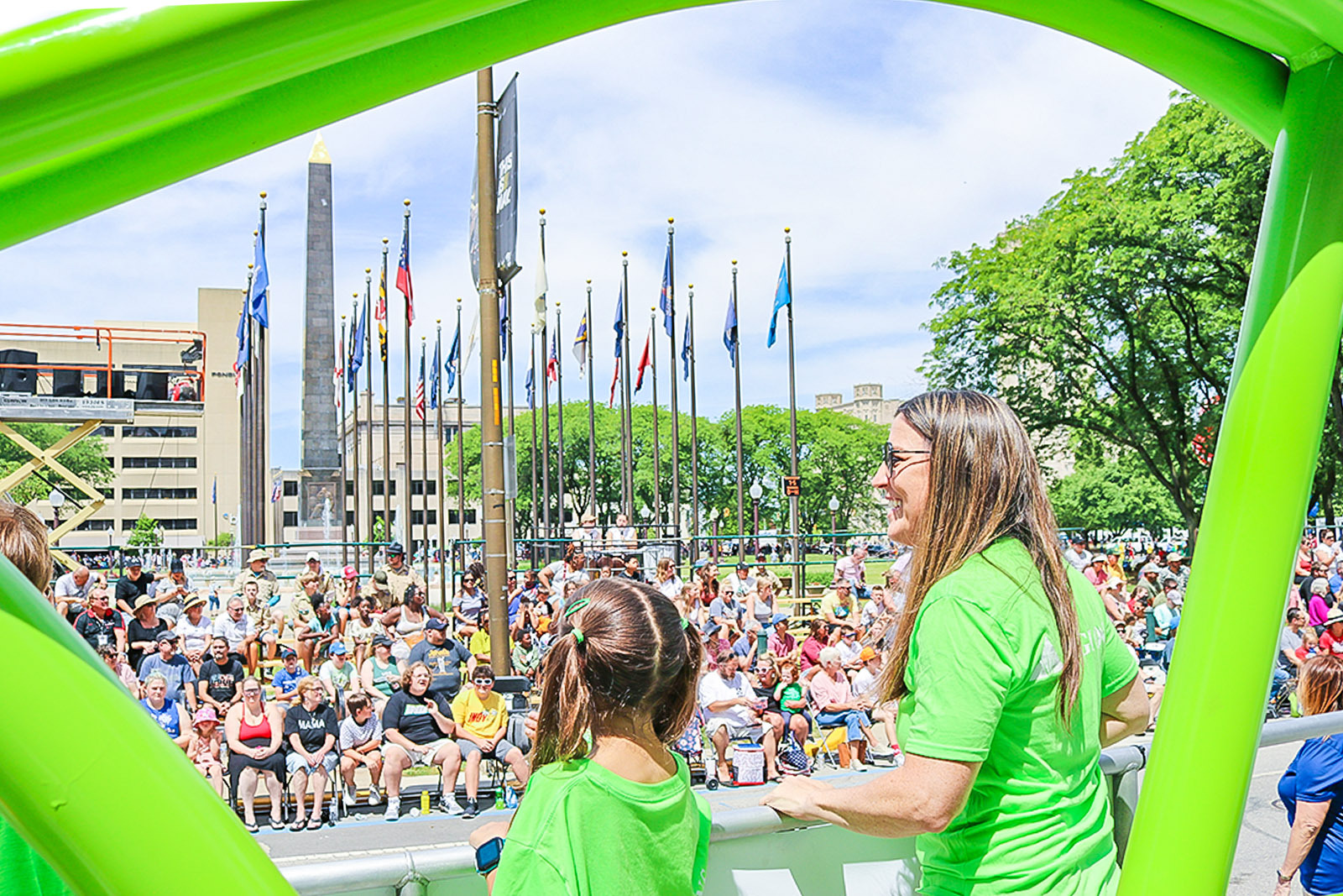 Regions Bank associate and child at Indy 500 Festival parade