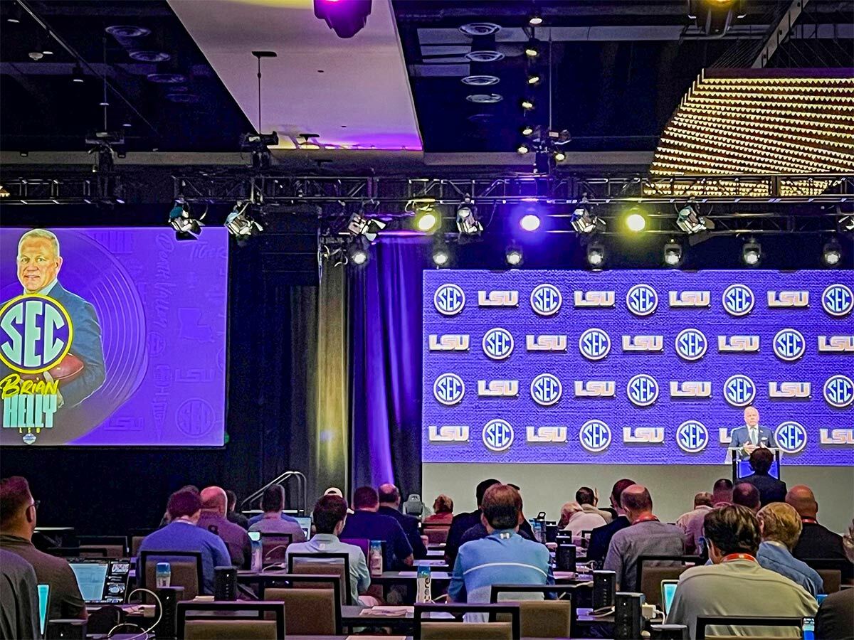 Brian Kelly speaking to a crowd.