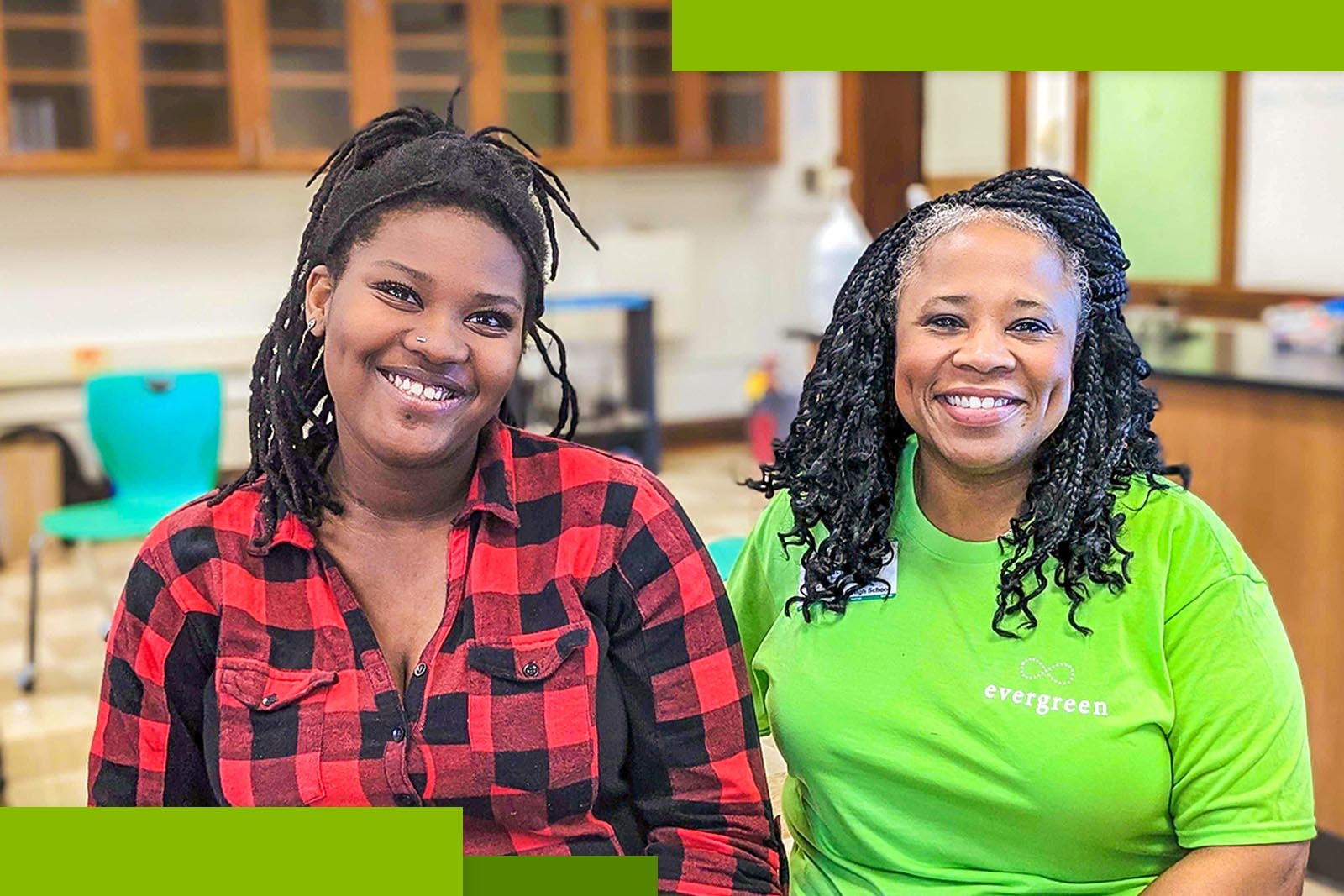 two women smiling at the camera
