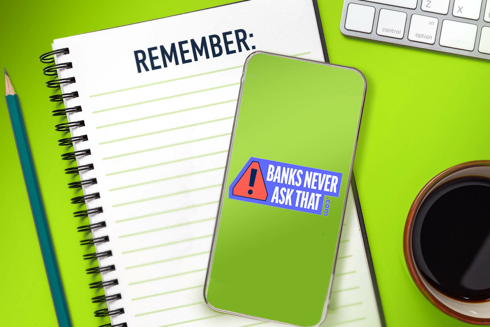 notepad, computer keyboard, cup of coffee and a phone. Ont...