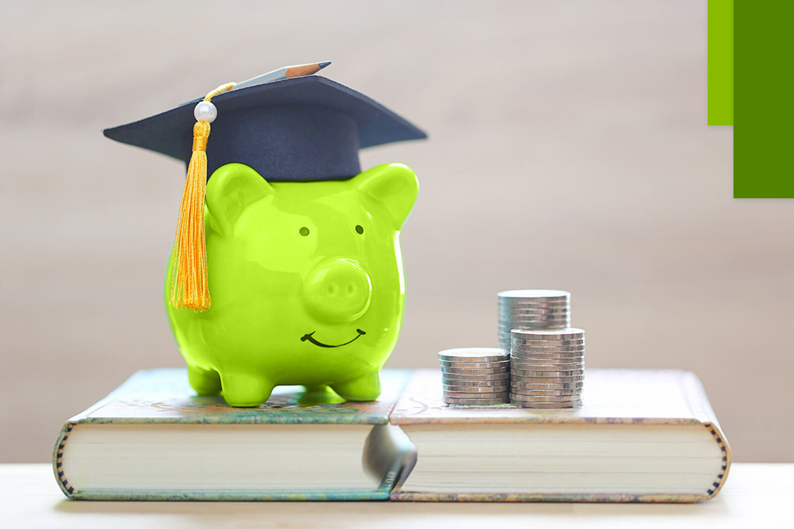 Piggy Bank with graduation cap, representing college savings.