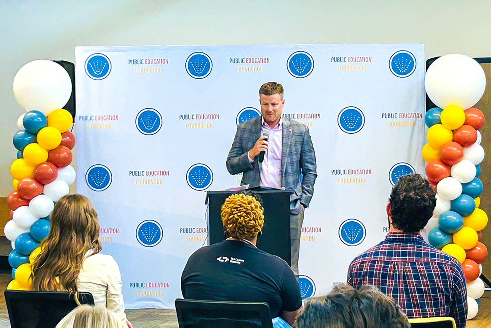 Jason Allen giving remarks in front of audience