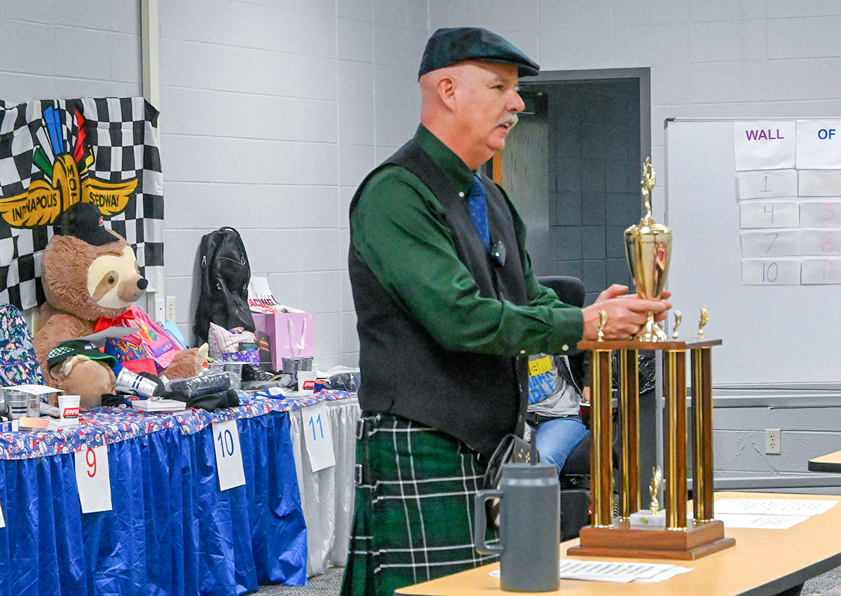Tim Griffin at Auction with the Trophy