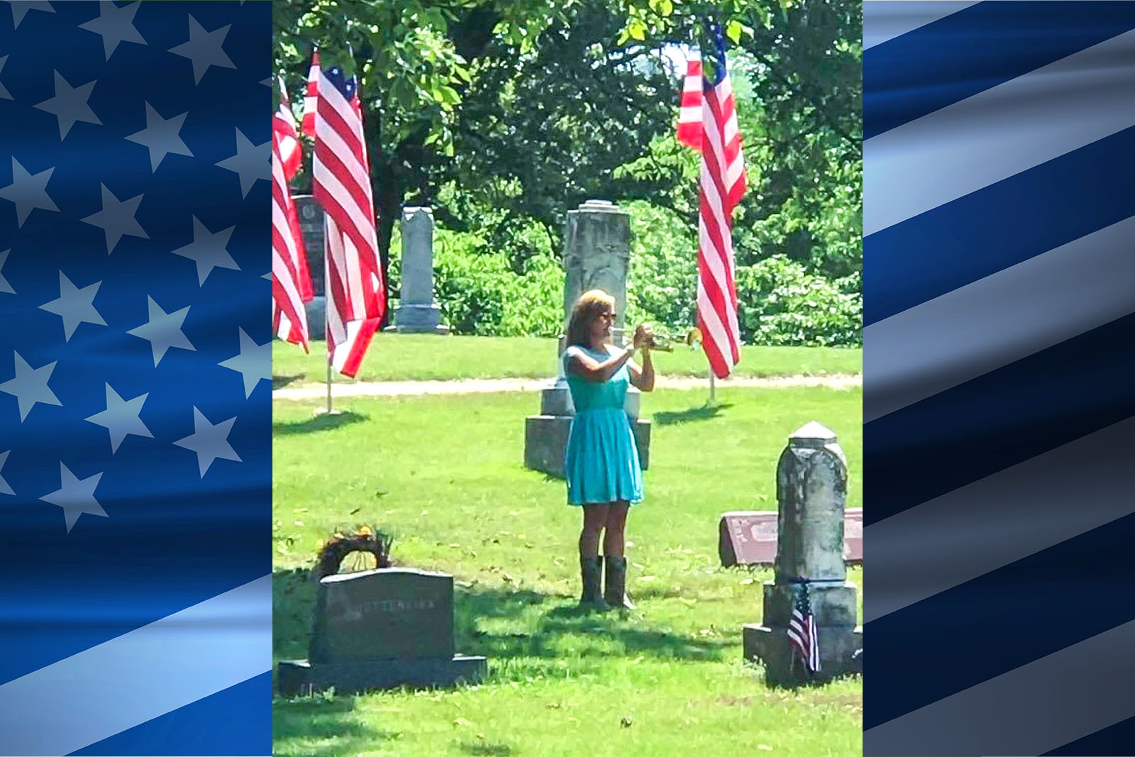 woman playing instrument at cemetery surrounded by American flags