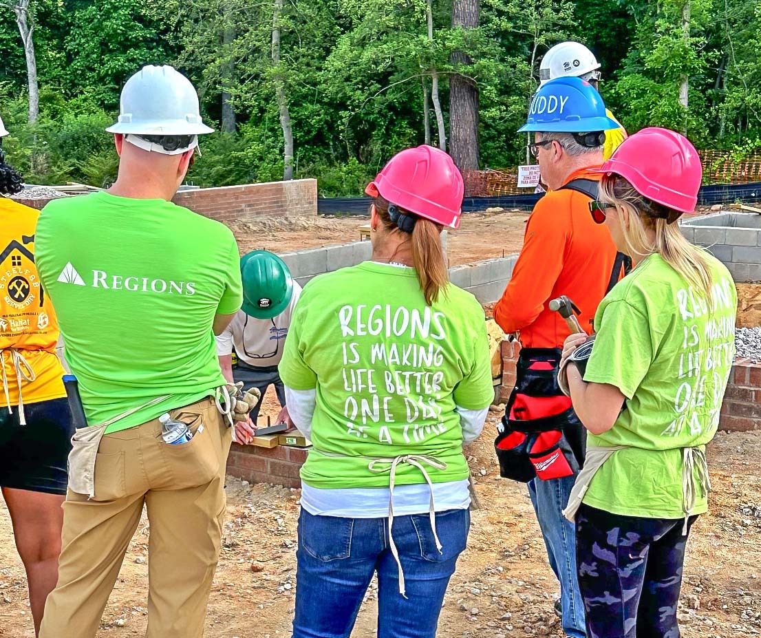 volunteers from Regions Bank at Habitat for Humanity home build site