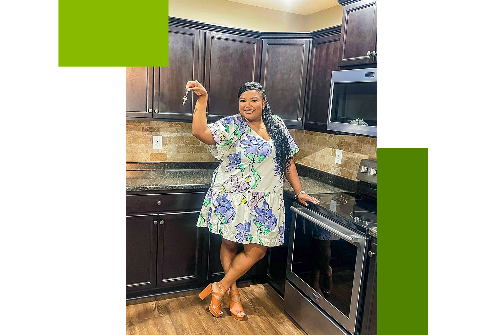 female homeowner holding a key in her kitchen