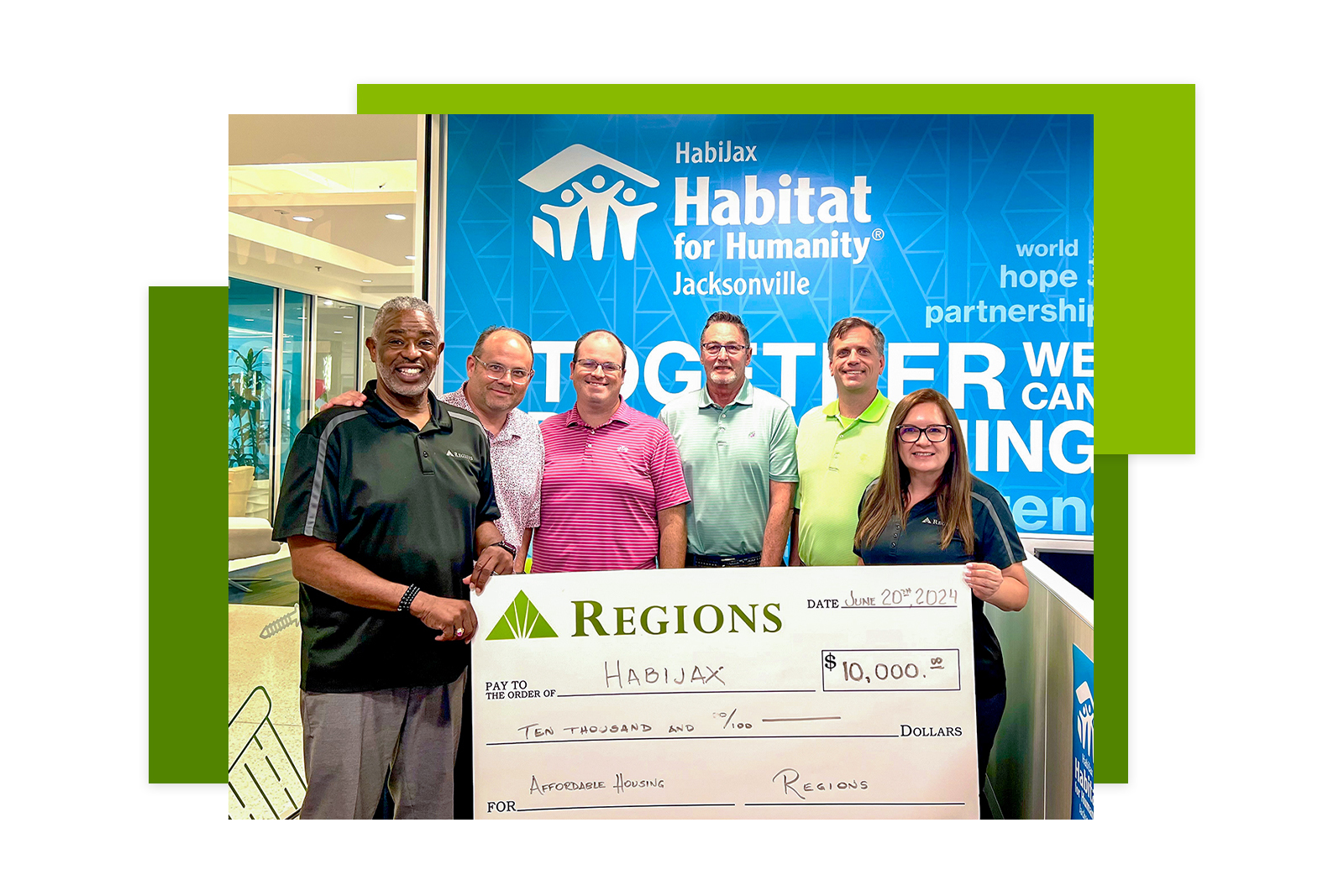 Regions Bank presents a $10,000 grant to Habitat for Humanity...