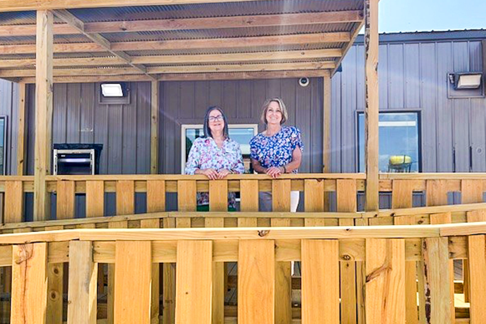 Regions associates in front of the Springhill Branch during redevelopment