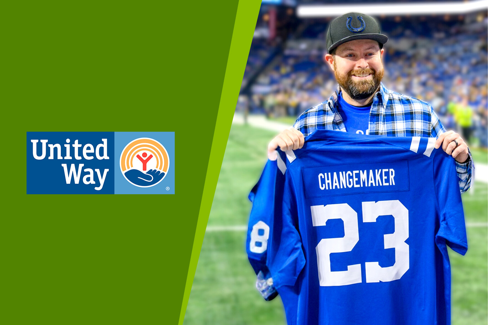 Photo of Eric Muller holding a football jersey on a...