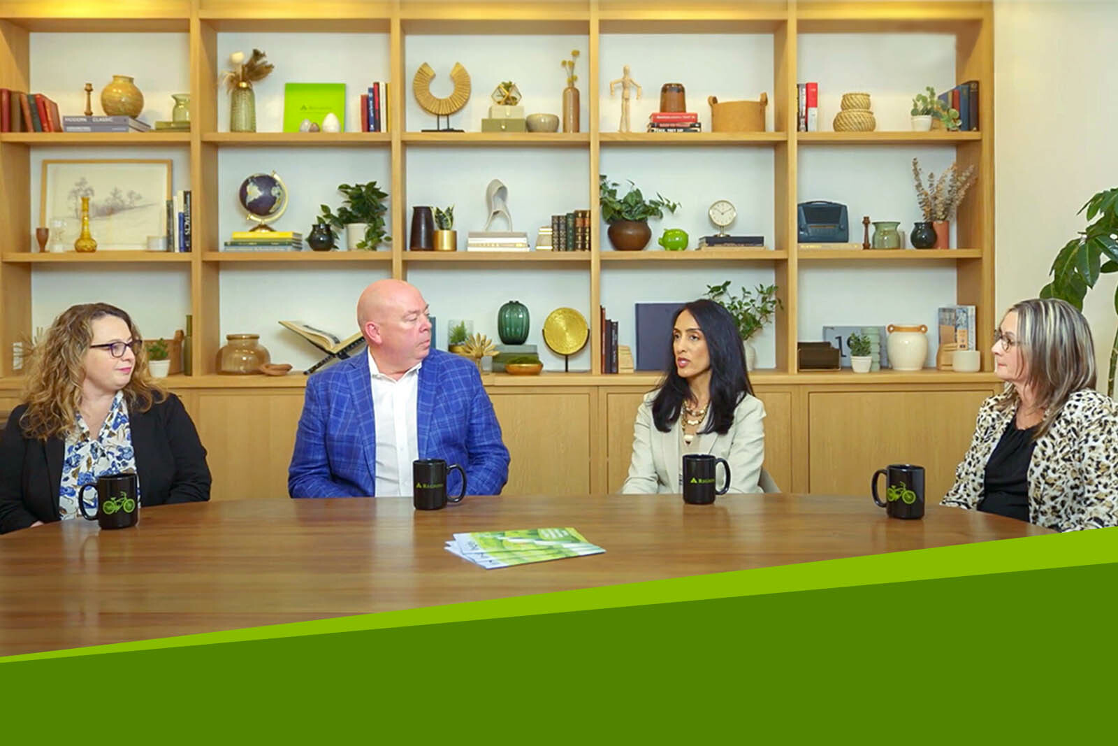 Four panelists talking at a Wealth Management fraud podcast.