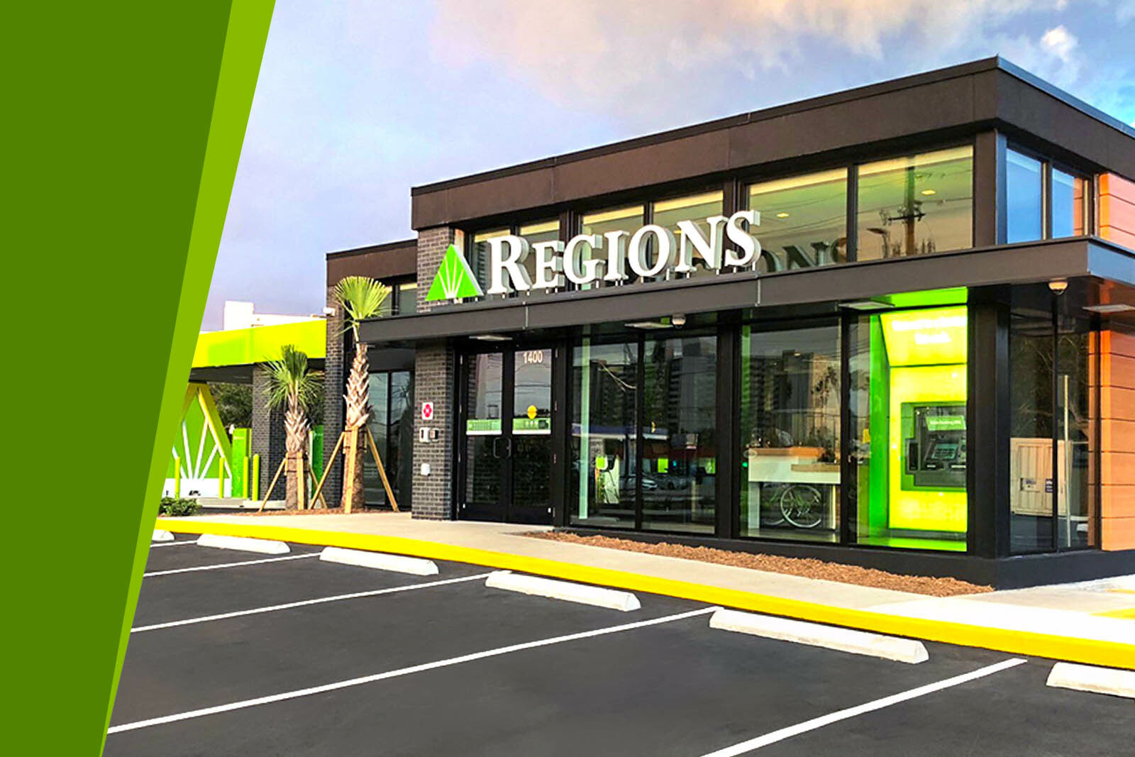 A Regions bank branch front entry way from the exterior.