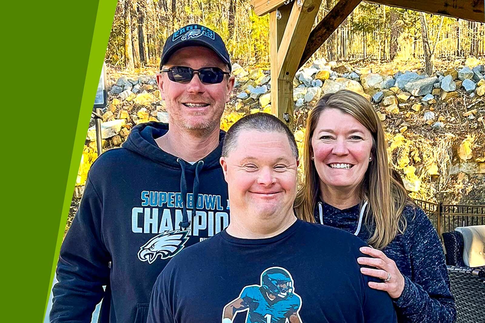 Derek Smith special olympian with his mom, Kara Newman and...