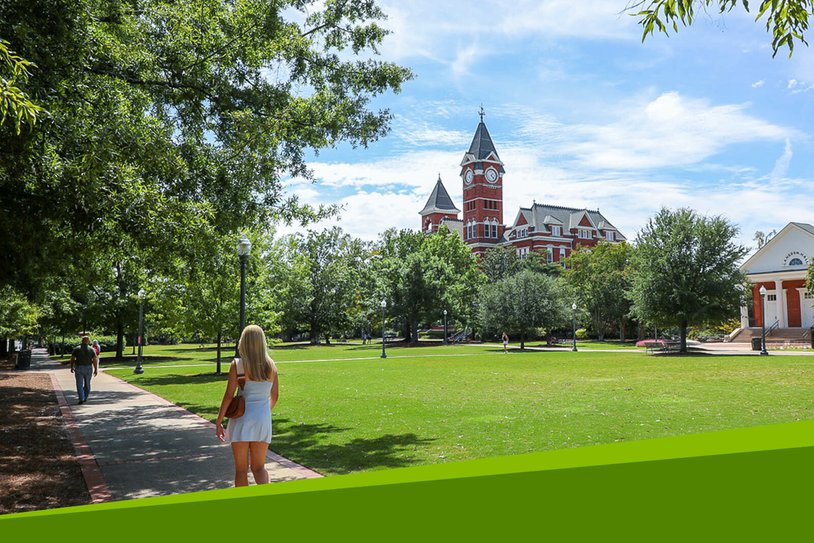 On a breathtaking autumn day, students head past Samford Hall...