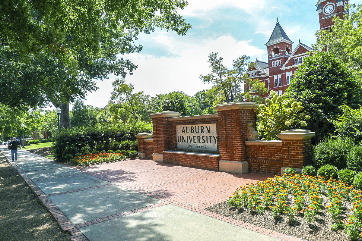 The granite Auburn University sign on College Street, sitting in front of Samford Hall, greets visitors and serves as the perfect backdrop for anyone looking for a keepsake photo.