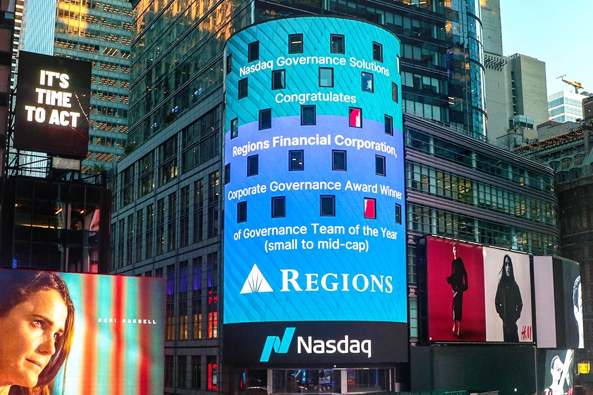Regions "Governance Team of the Year" announcement on a billboard in Times Square. 