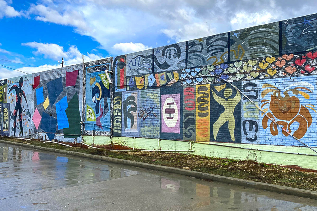 A Baton Rouge mural emphasizes the arts and delectable seafood.