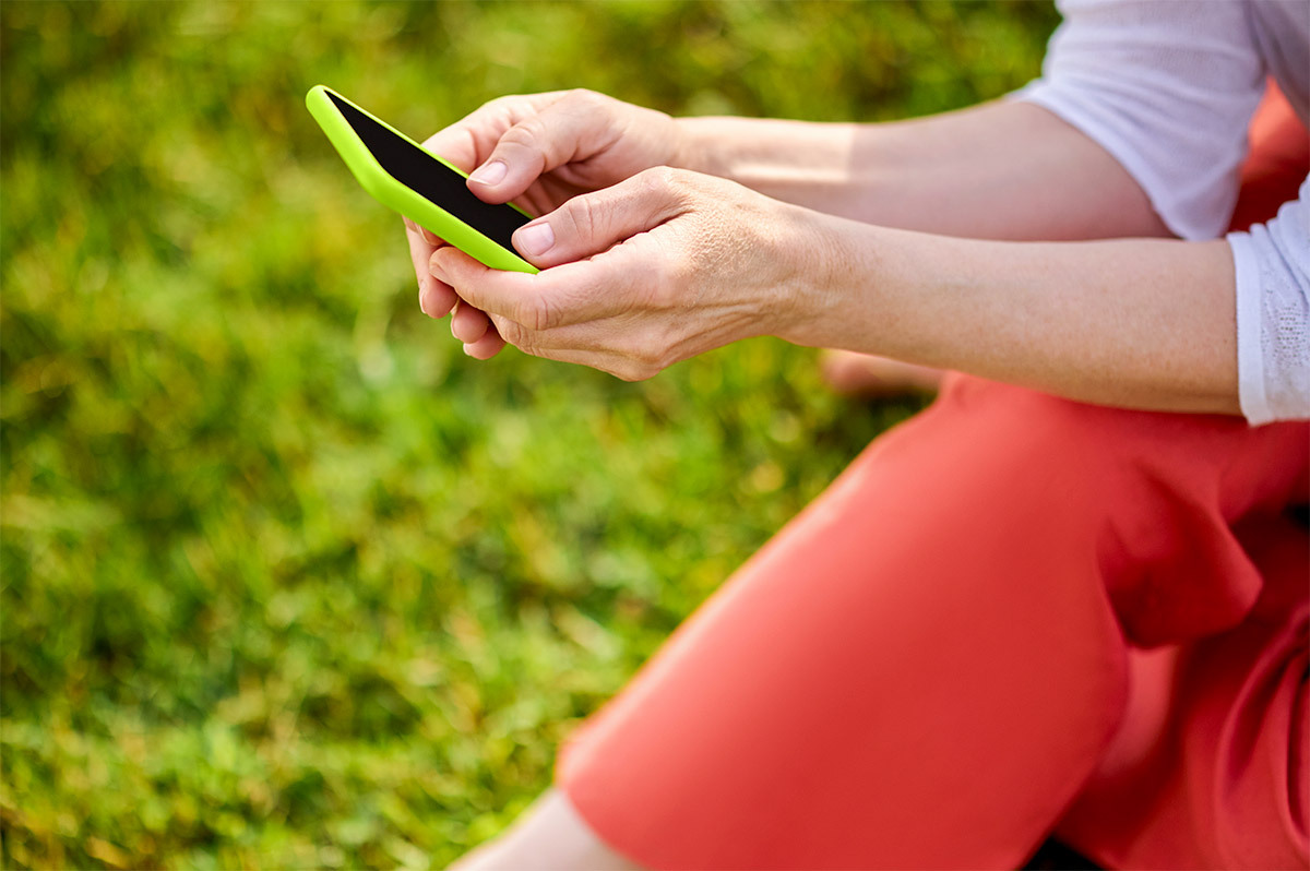 A women browsing on her phone. 