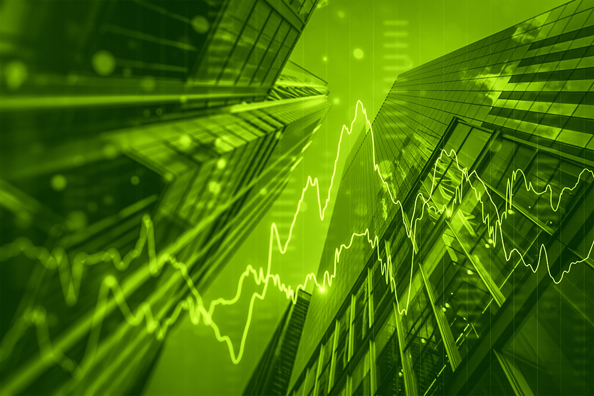 Financial graph trend with abstract buildings in the background.