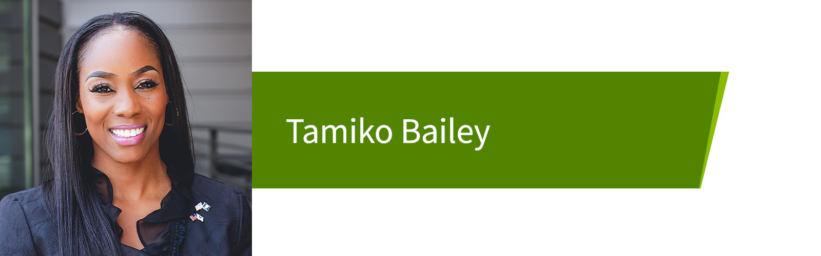Headshot photo of Tamiko Bailey, President and CEO of Bailey’s Premier Services next to a plane.