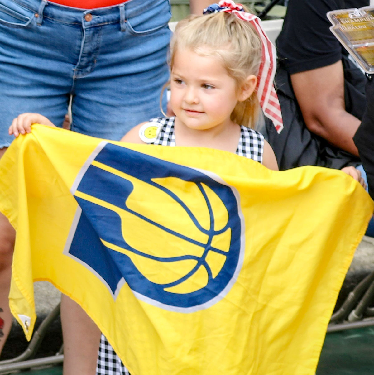 Young girl with Pacers flag.