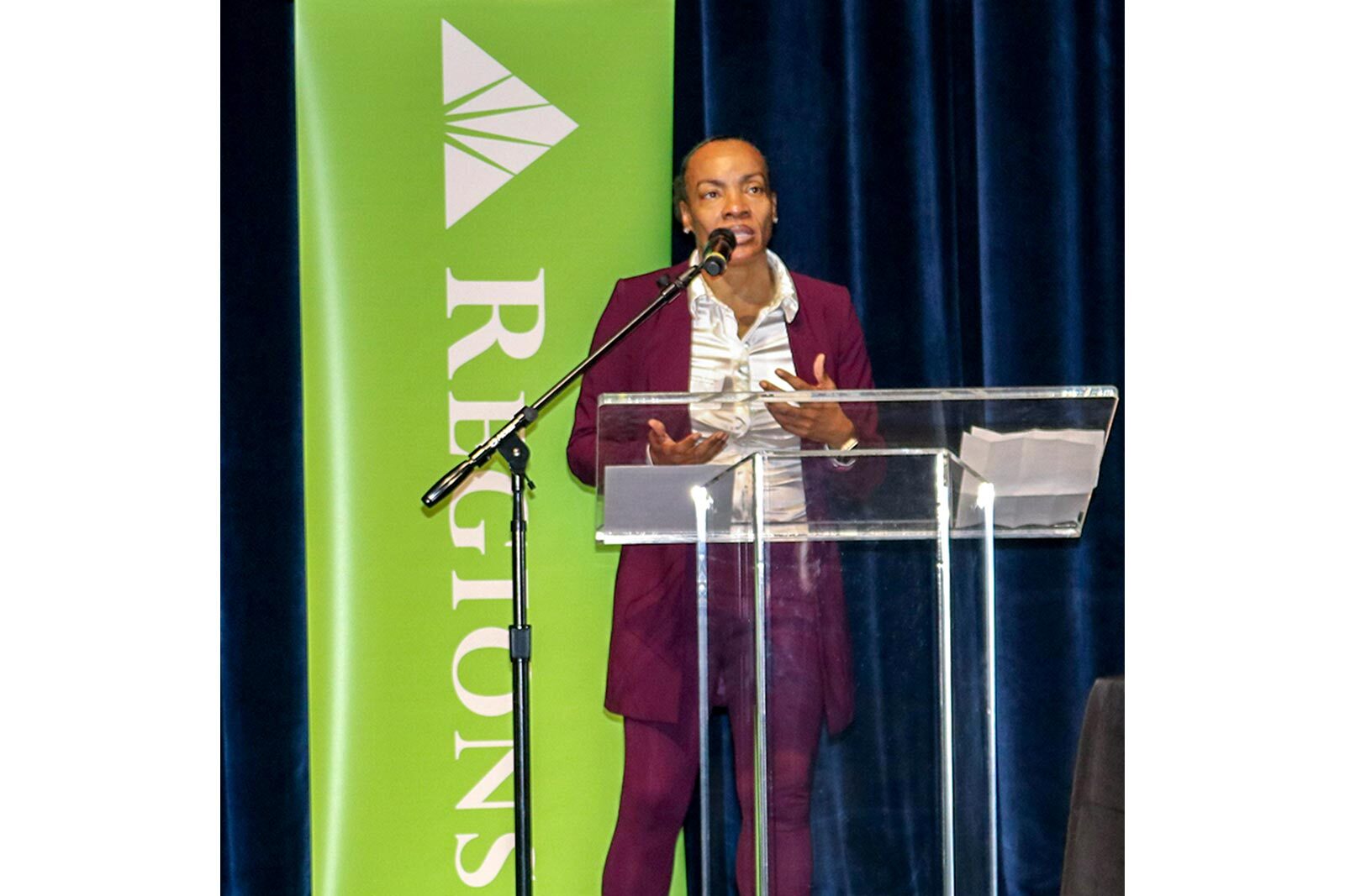 Shawntelle Fisher speaking at Regions Bank event. 
