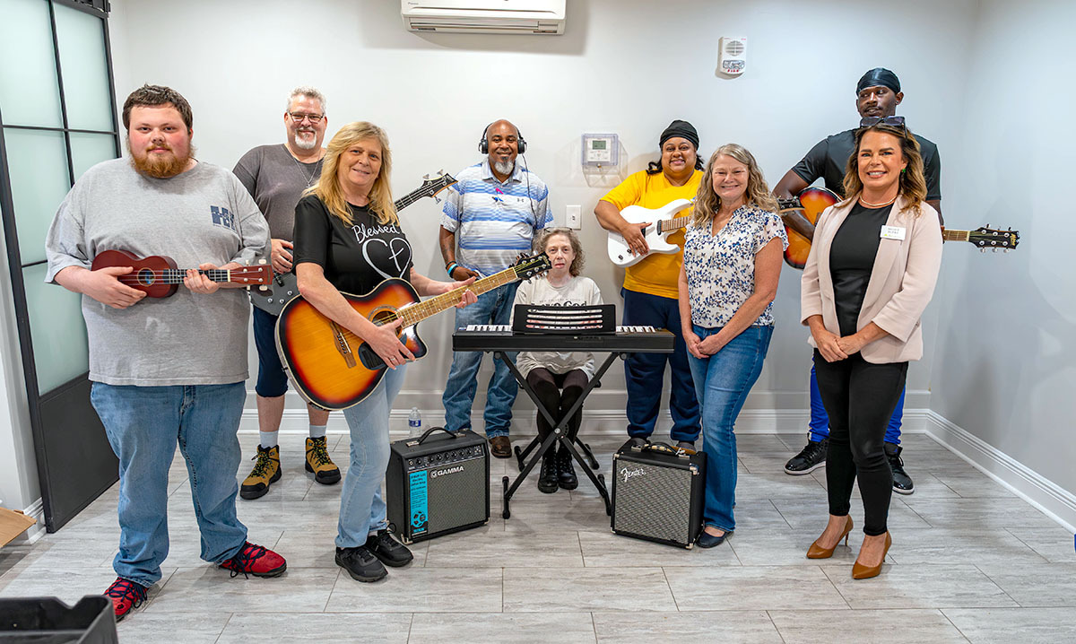 NOLA group with donated instruments.