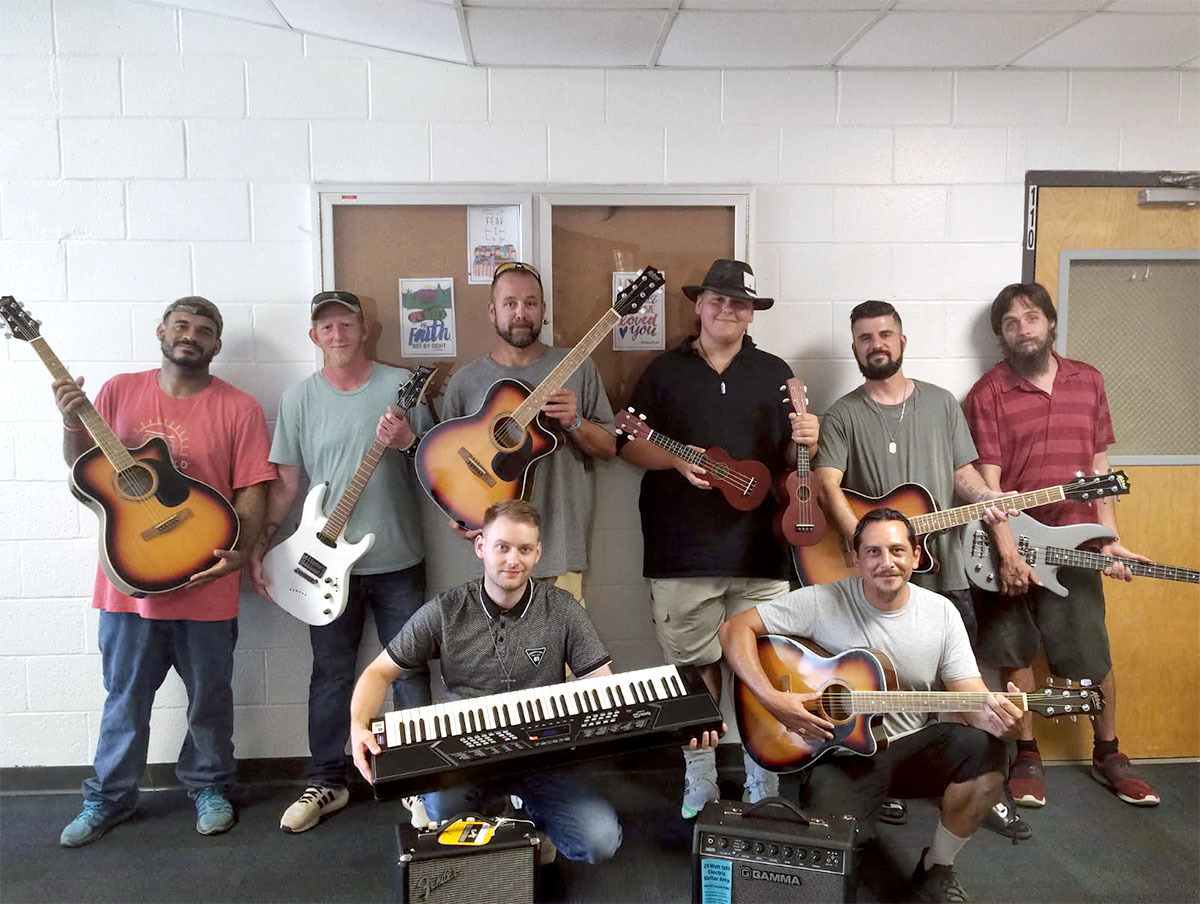 NOLA group with donated instruments.