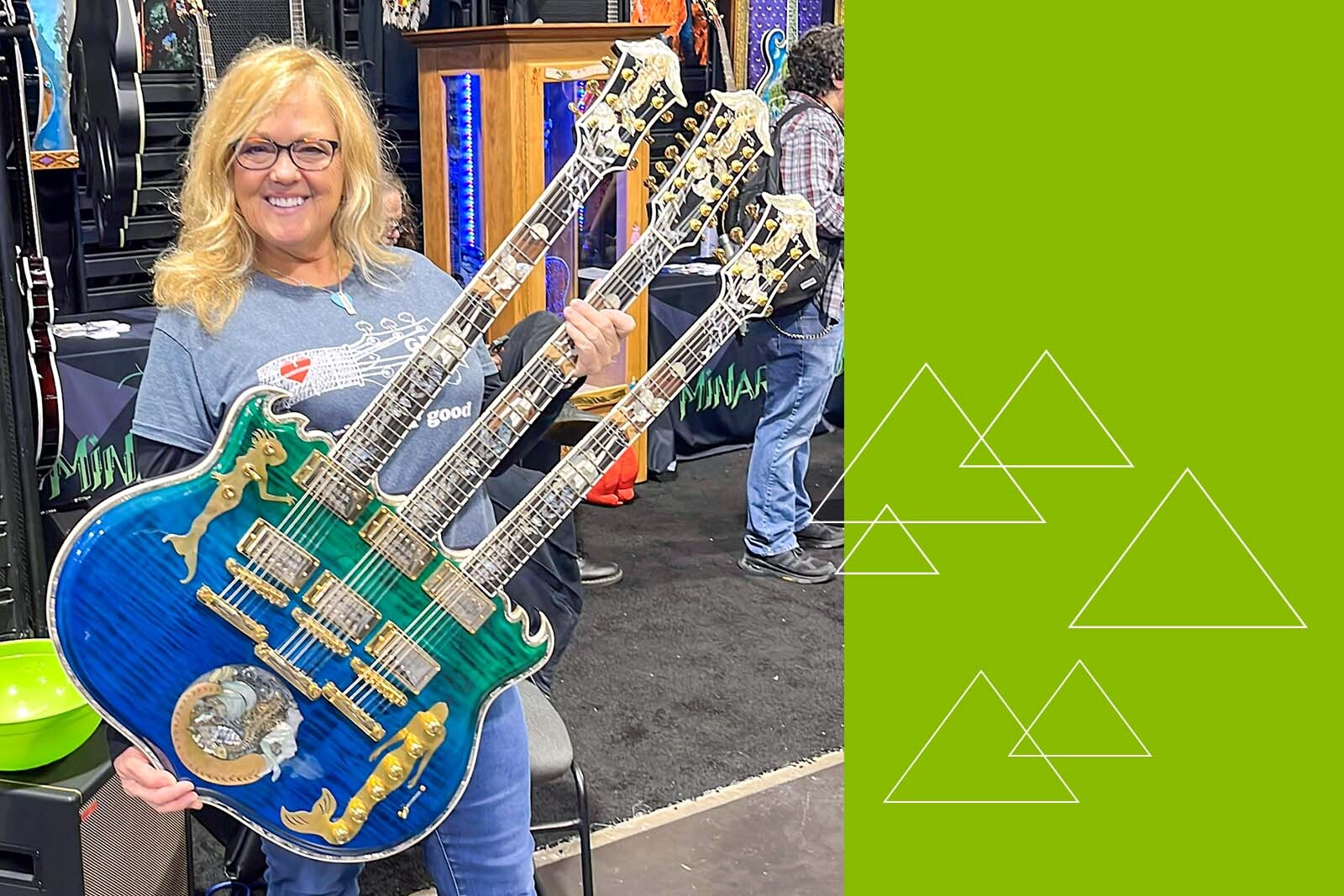 Sandy Green with the guitar. 