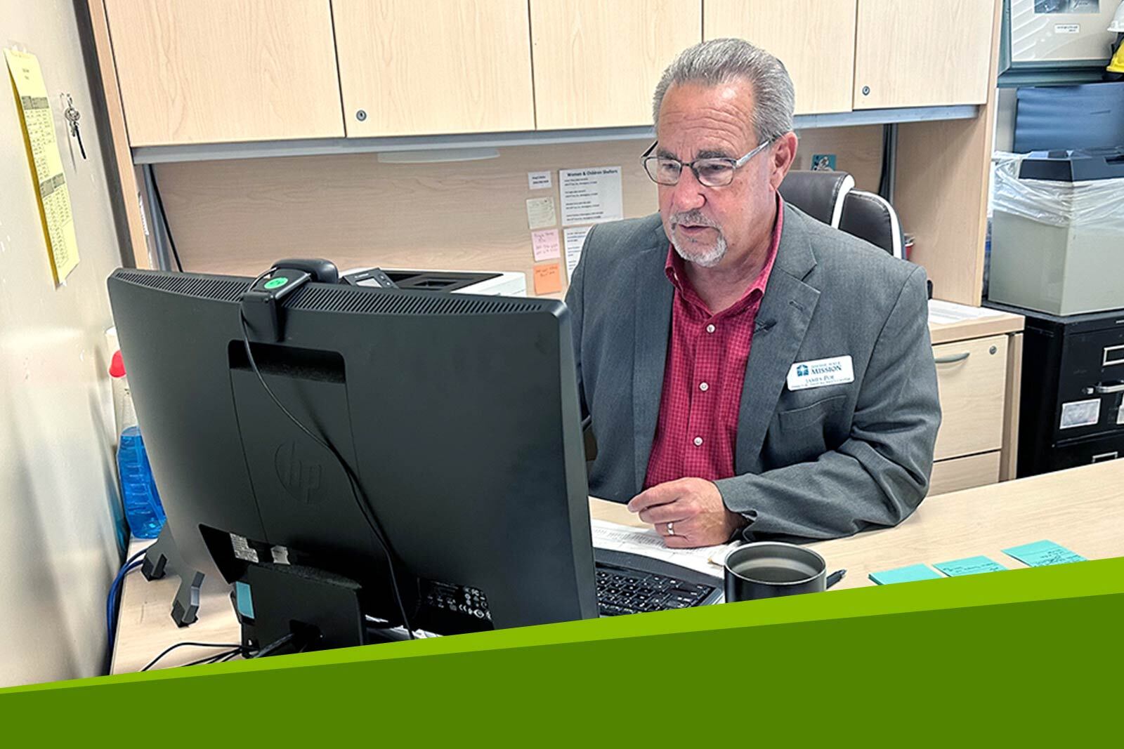 James Poe in the office of Jimmie Hale Mission, a...